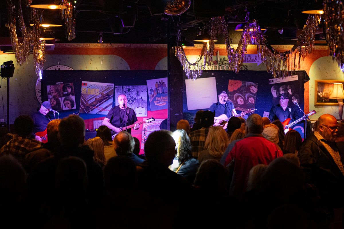 Revolution Pie plays at Barfly Retro Bar and Arcade in Downtown Kent during BeatleFest on Feb. 23, 2024.