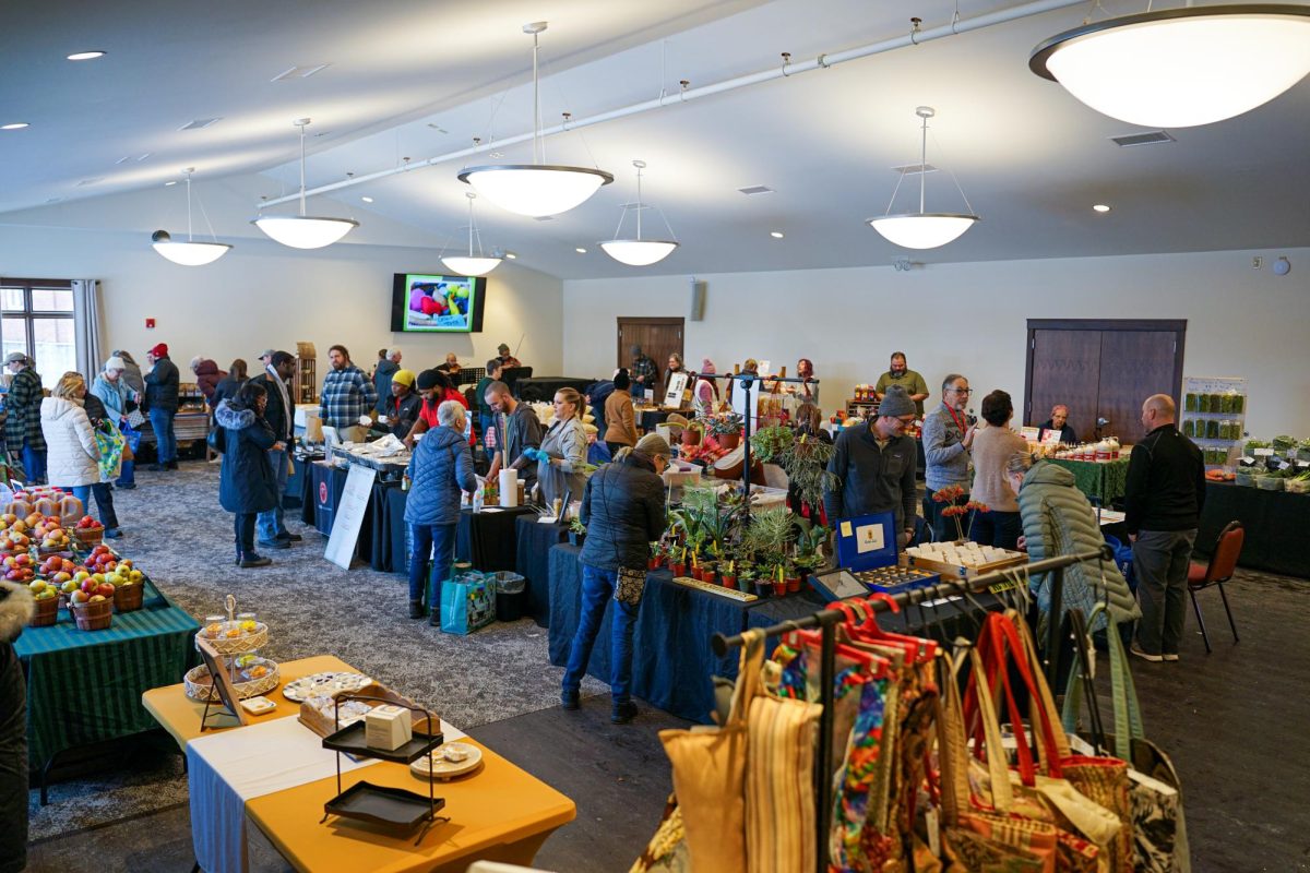 Attendees of the Haymakers Farmers Market peruse the various products up for sale on Feb. 17, 2024.