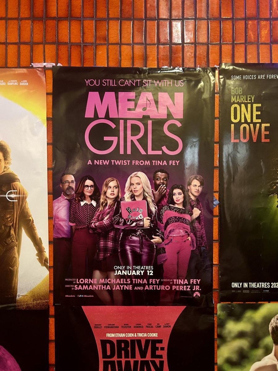 A poster for Mean Girls hangs inside the MovieScoops Kent Plaza Cinemas on Feb. 2, 2024. 