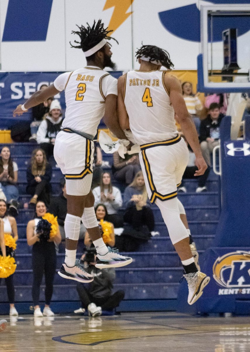 Kent State Golden Flashes Reggie Bass and Chris Payton Jr. celebrate after Paytons dunk during the game against Northern Illinois University on Feb. 17, 2024.