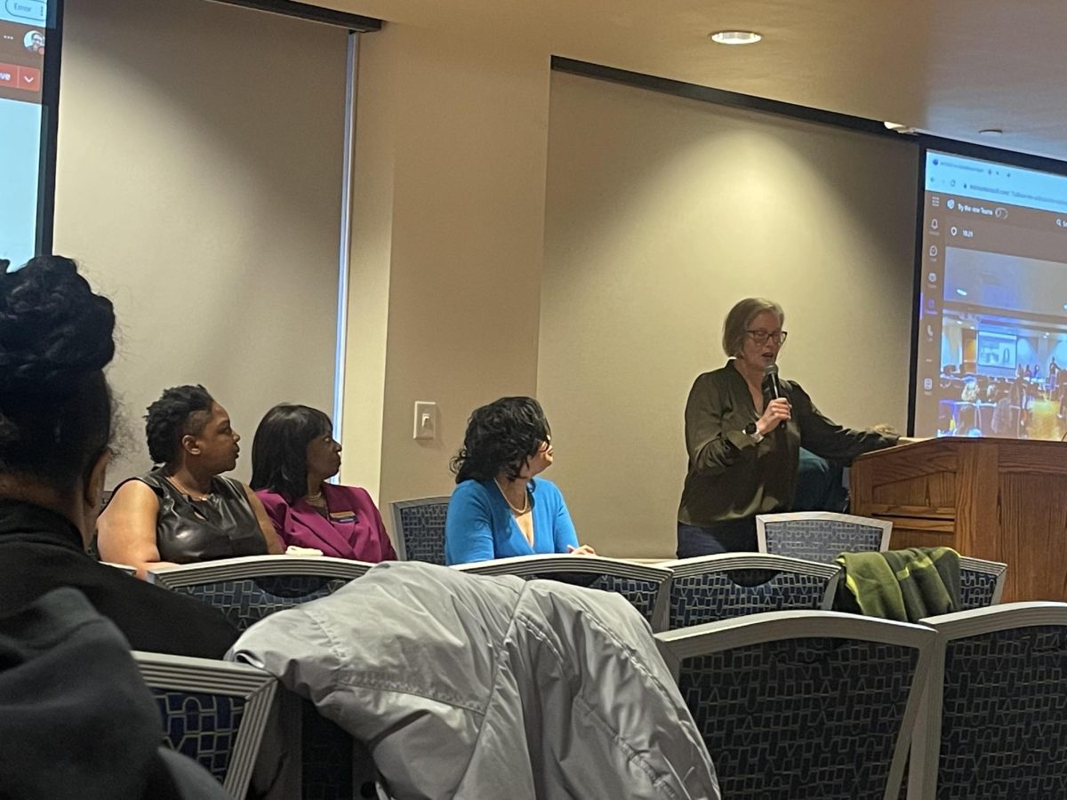 A panel discussion with Jazmin Long, dean Versie Johnson-Mallard, Dr. Shawana Moore, Angela Neal-Barnett and Clare Stacey taking place after the screening of "Toxic: A Black Woman's Story"