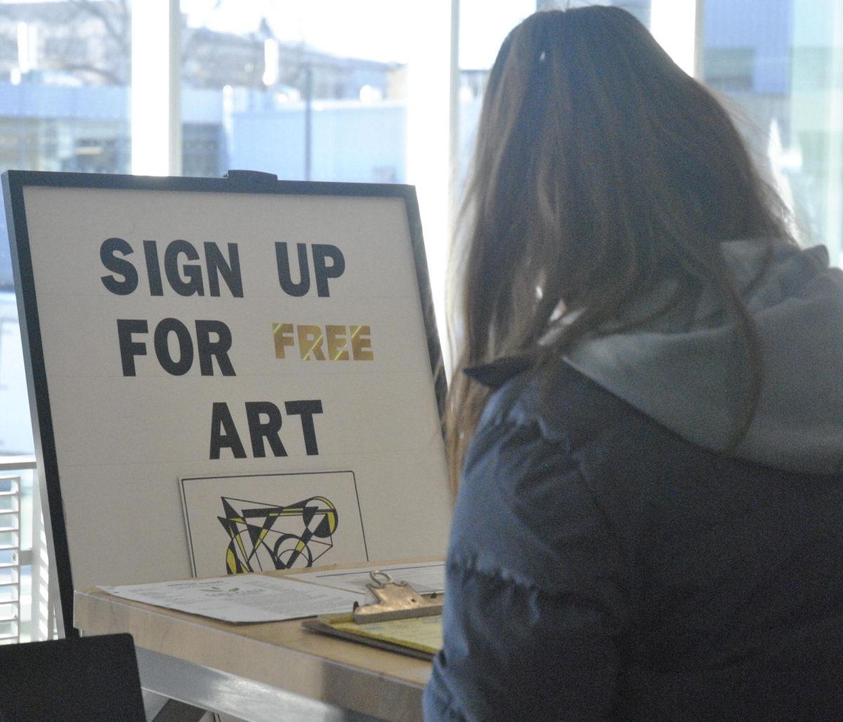 Frank Alexander gives out free art at the Farmers MArket on Tuesday located in the DI hub from 4-7pm. 