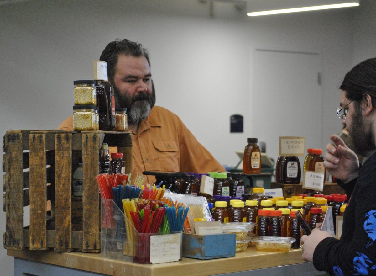 Matt Kline owner of Klines honey bee farm, displays honey at the Farmers market on Tuesday from 4-7 pm at the DI hub. 