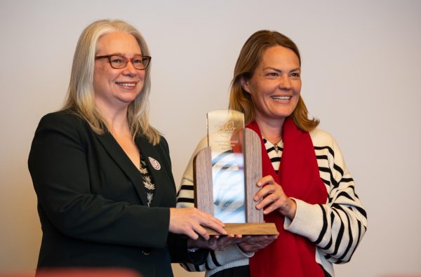 Director of the Ohio Environmental Protection Agency Anne Vogel presents the 2023 Encouraging Environmental Excellence award to Sustainability Manager Melanie Knowles on March 19, 2024.