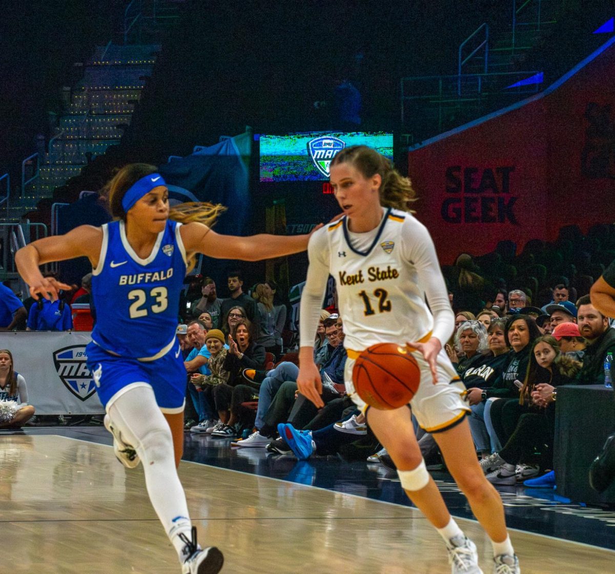Kent State junior Jenna Batsch runs the ball down the court looking for a teammate to pass the ball to in the championship game against Buffalo at the MAC Womens Basketball tournament on Saturday, March 16, 2024. 