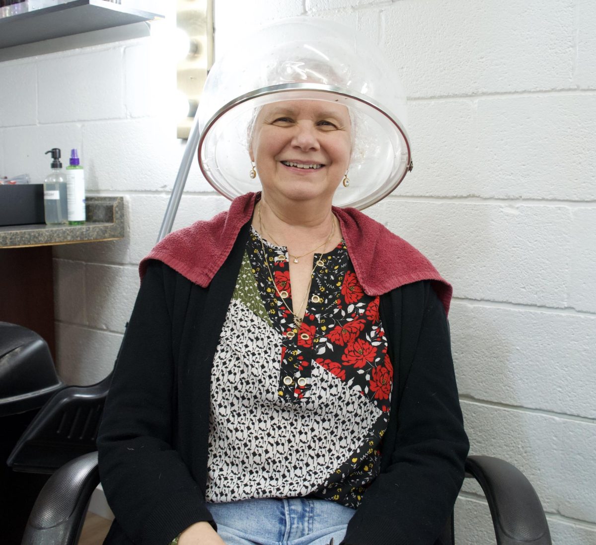 Nothing but smiles from Amy Lange as she under the dryer at A Cut Above Hair and Nail Salon on March 22, 2024.