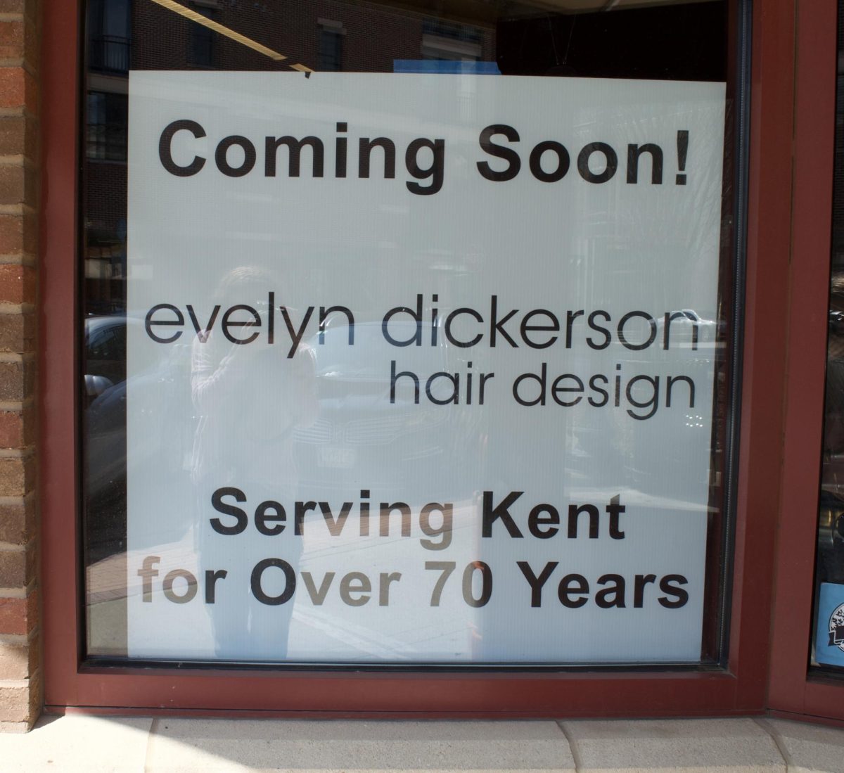The “coming soon” sign for Evelyn Dickerson Hair Design located at 175 E. Erie Street, the location is still undergoing renovations as of March 22, 2024. 