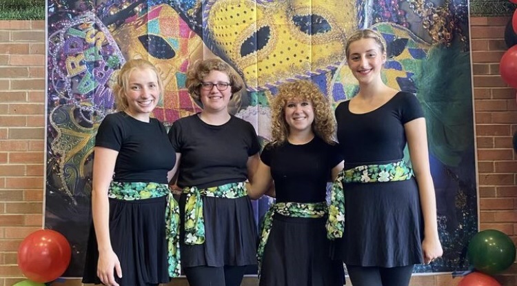 Members of the universitys Irish Dance Club, including co-president Addison Foreman (center right), pose after a performance in 2023. 