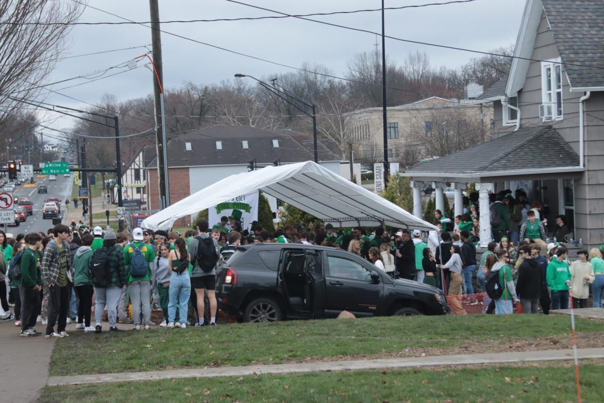 The crowd of the Frat Houses looking lively on March 9, 2024 for the annual Fake Paddys Day celebration.