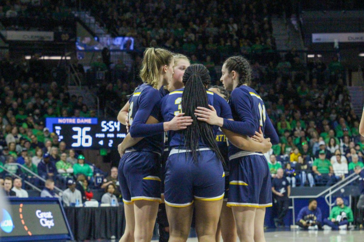 Kent+State+in+a+team+huddle+after+a+tough+start+to+their+game+against+the+University+of+Notre+Dame+on+March+23%2C+2024.