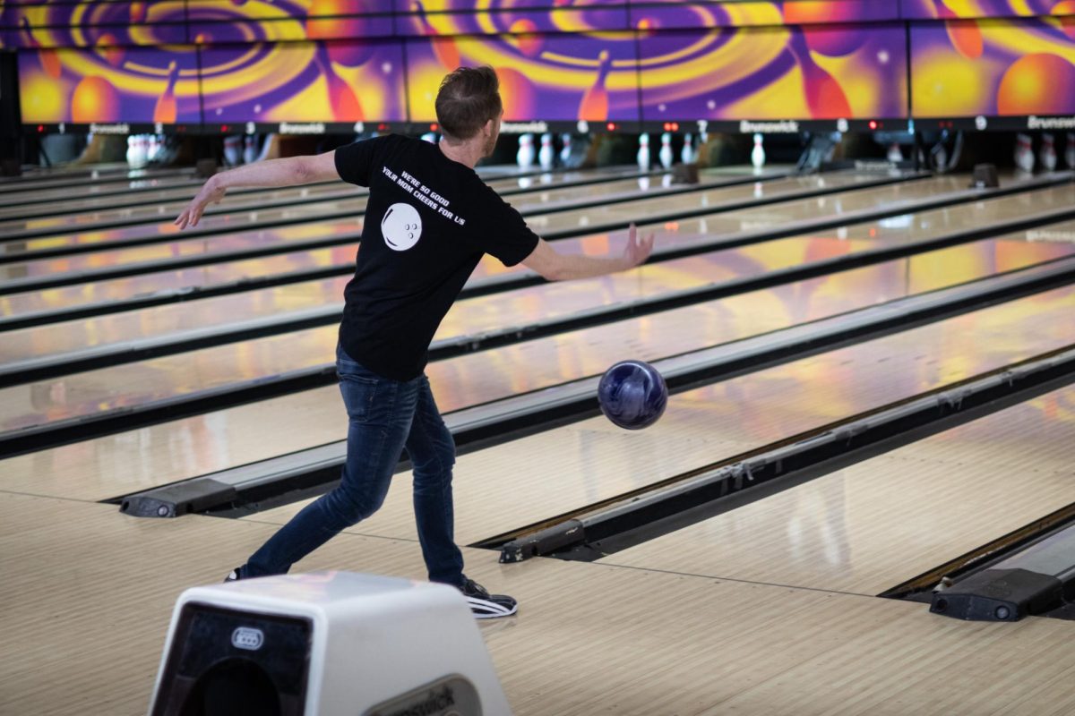 Pocket Pounder team member Andrew Pepley bowls at Kent Lanes on March 23, 2024 as a part of the Kamper city bowling league. 