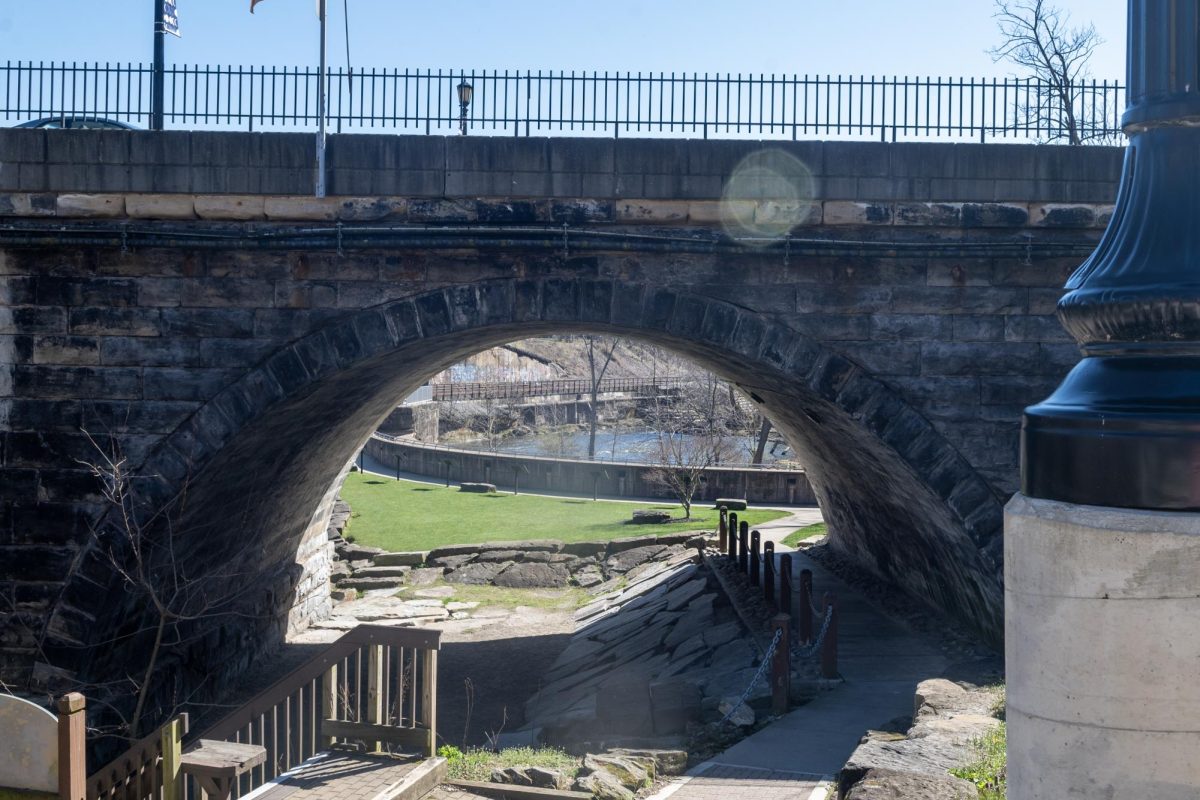 One of the most picturesque places in Kent, we see the western arch of the Main Street Stone Bridge, part of Franklin Mills Riveredge Park, looking over the old Kent Dam.  Photo taken on March 28, 2024.
