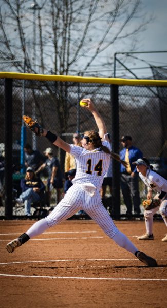 Sophomore Macy Irelan pitches in the game against Youngstown on March 13, 2024.
