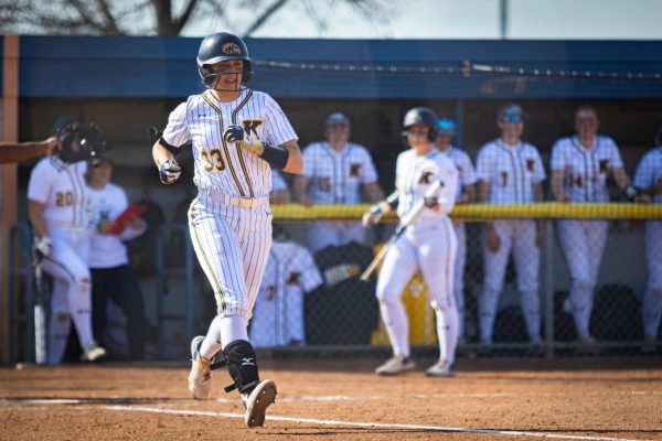 Bri Despines runs down the baseline to first base after hitting the ball in the game against Youngstown on March 13, 2024.
