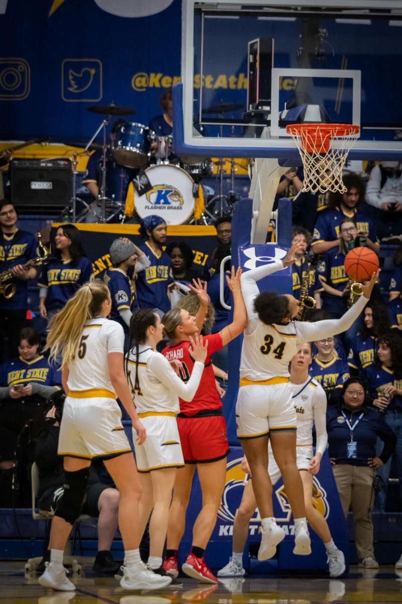 Kent State Freshman Janae Tyler catches the ball after an unsuccessful attempt to score by a Ball State player during the game on March 6, 2024.