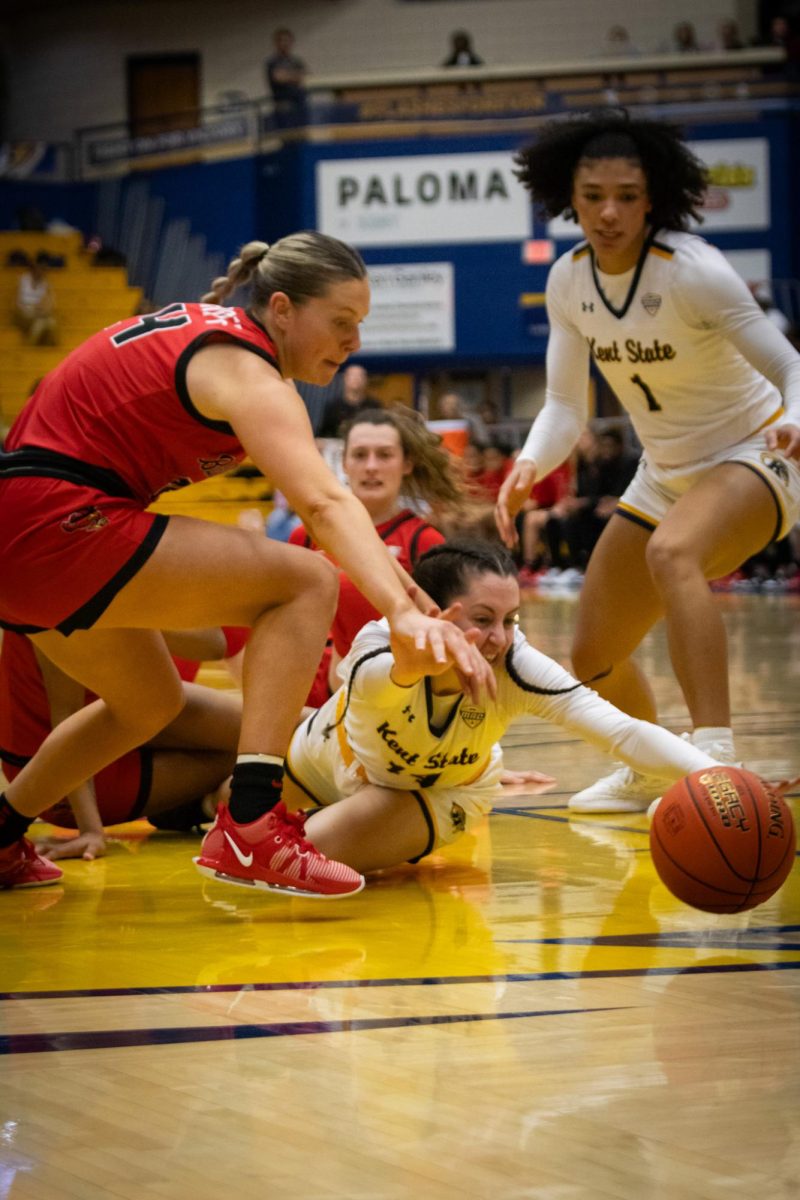 Guard Katie Shumate dives for the ball in the game against Ball State University on March 6, 2024.