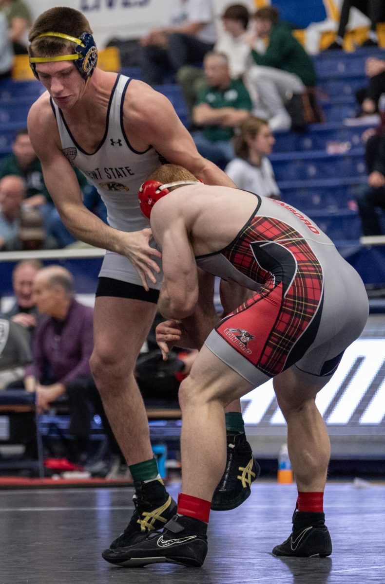 Junior Blake Schaeffer pulls out of the leg hold against Edinboro's Jack Kilner during their quarterfinal match at the Mid-American Conference Wrestling Championships at Kent State on March 8, 2024.  Schaeffer went on to win this match with a 2-1 decision on his way to a third place finish in the tournament, Kent State's highest individual finish.  