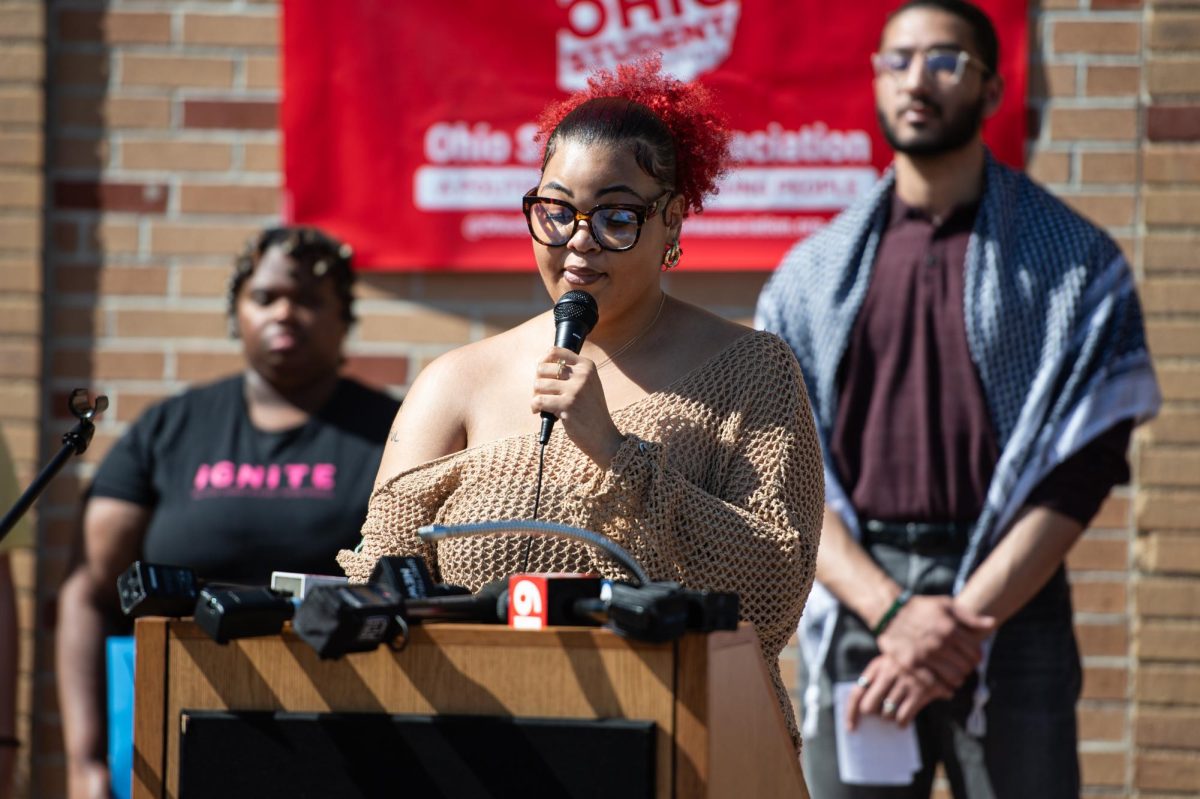 Junior AKyra Holley, co-director of Sister Circle, speaks during the press conference outside Oscar Ritchie Hall April 16, 2024.