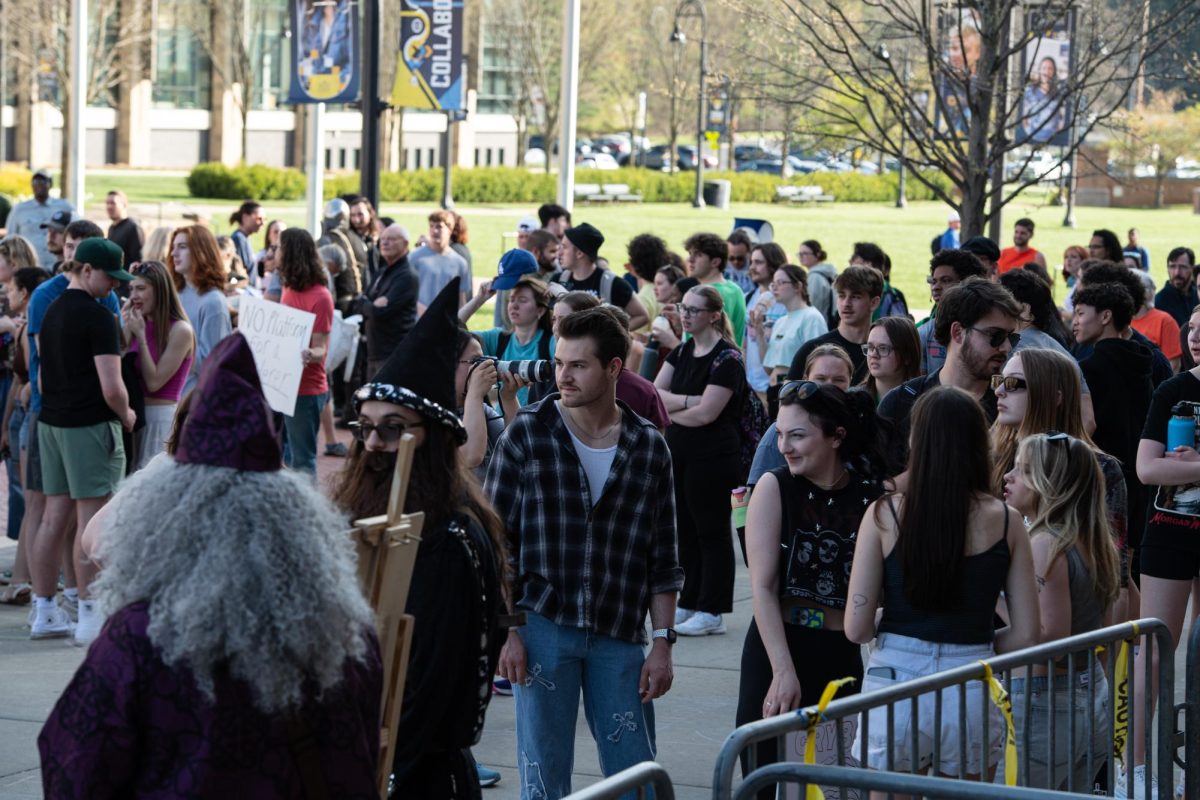 Protesters gather along the barricades set up in front of The Student Center arch to speak out against Kyle Rittenhouses speech April 16, 2024. 