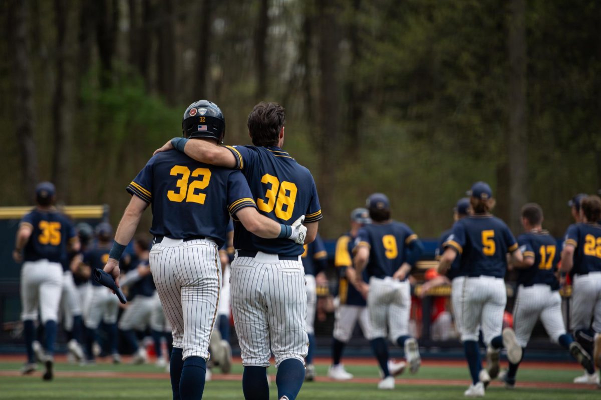 The+baseball+team+celebrates+after+a+victory+over+Bowling+Green+on+April+28%2C+2024.+The+Golden+Flashes+won+with+a+final+score+of+12-2.