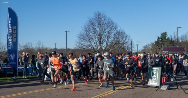 Runners start the Black Squirrel 5k on April 13, 2024