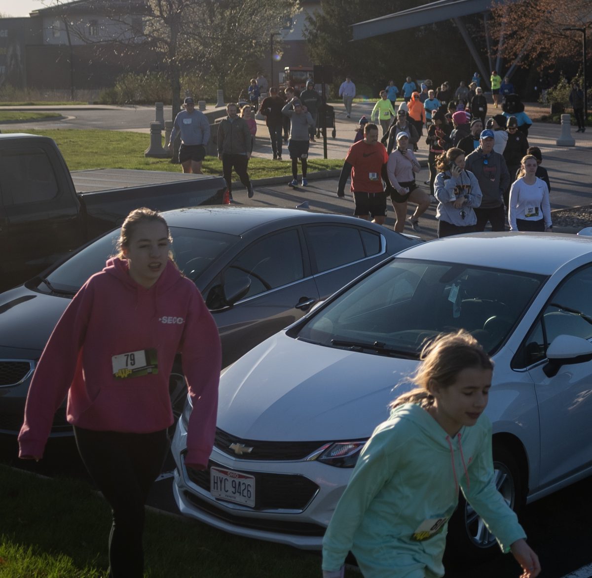 Competitors make their way to the Black Squirrel 5k start line on April 13, 2024. 