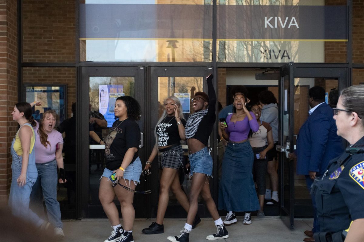 Attendees of The Rittenhouse Recap exit the KIVA while shouting Black Lives Matter toward the crowd of protestors April 16, 2024.