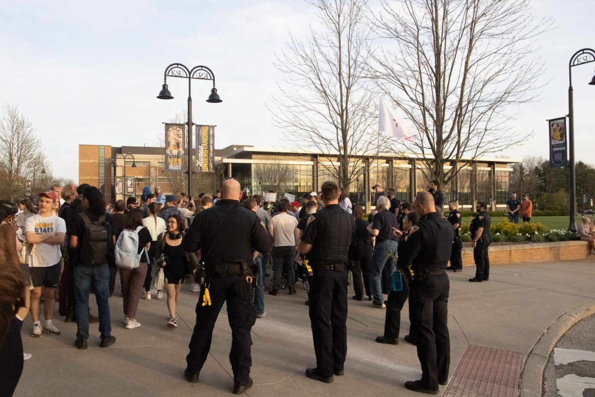 Kent police survey the crowd on April 16, 2024 after the protest against Kyle Rittenhouses presence on Kent States campus comes to an end.