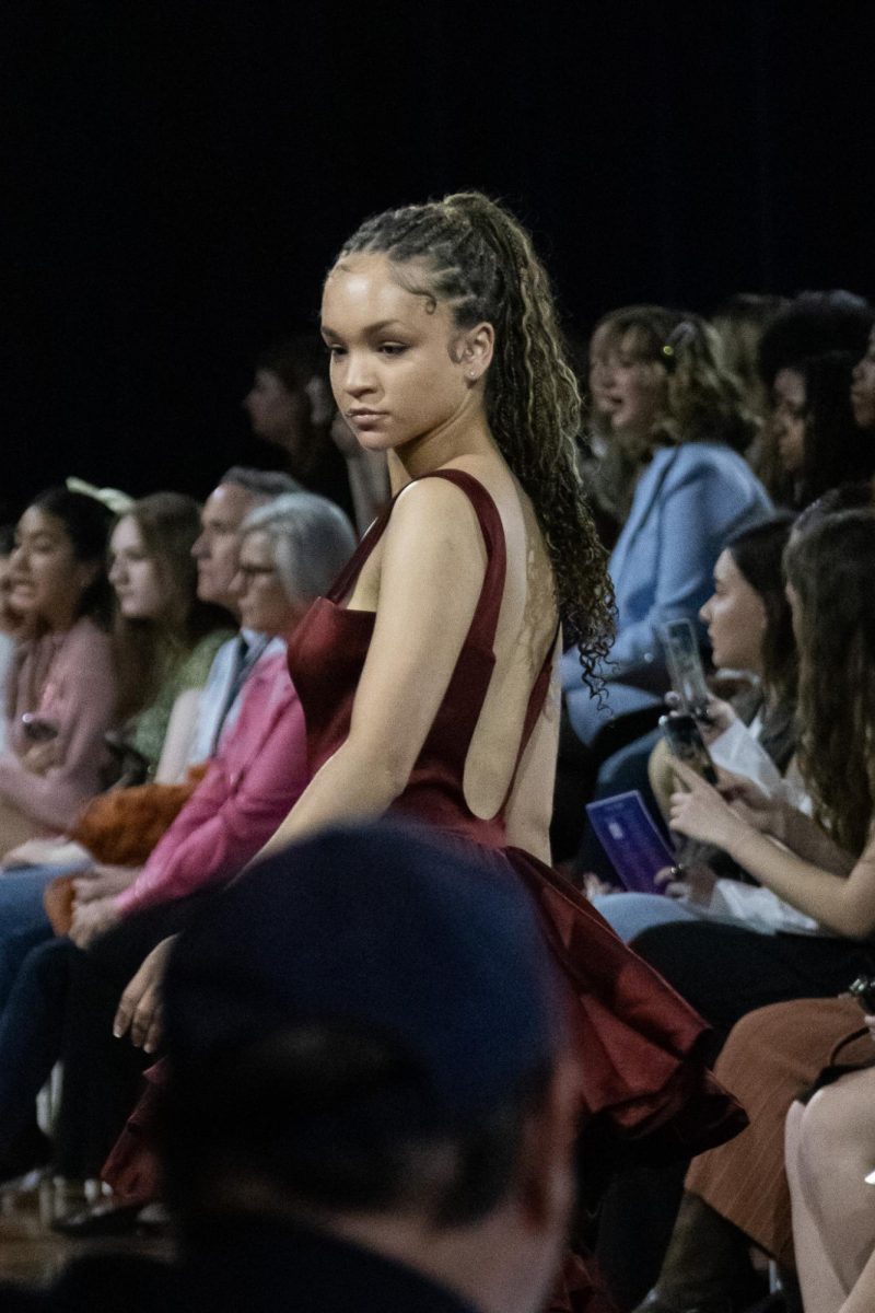 A model stops to pose in front of the gathered crowd on April 25, 2024 during the KSU 2024 Annual Fashion Show.