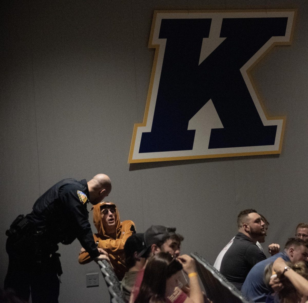 Attendee of the Kyle Rittenhouse Recap talks to a police officer located at one of the exits, on April 16, 2024.