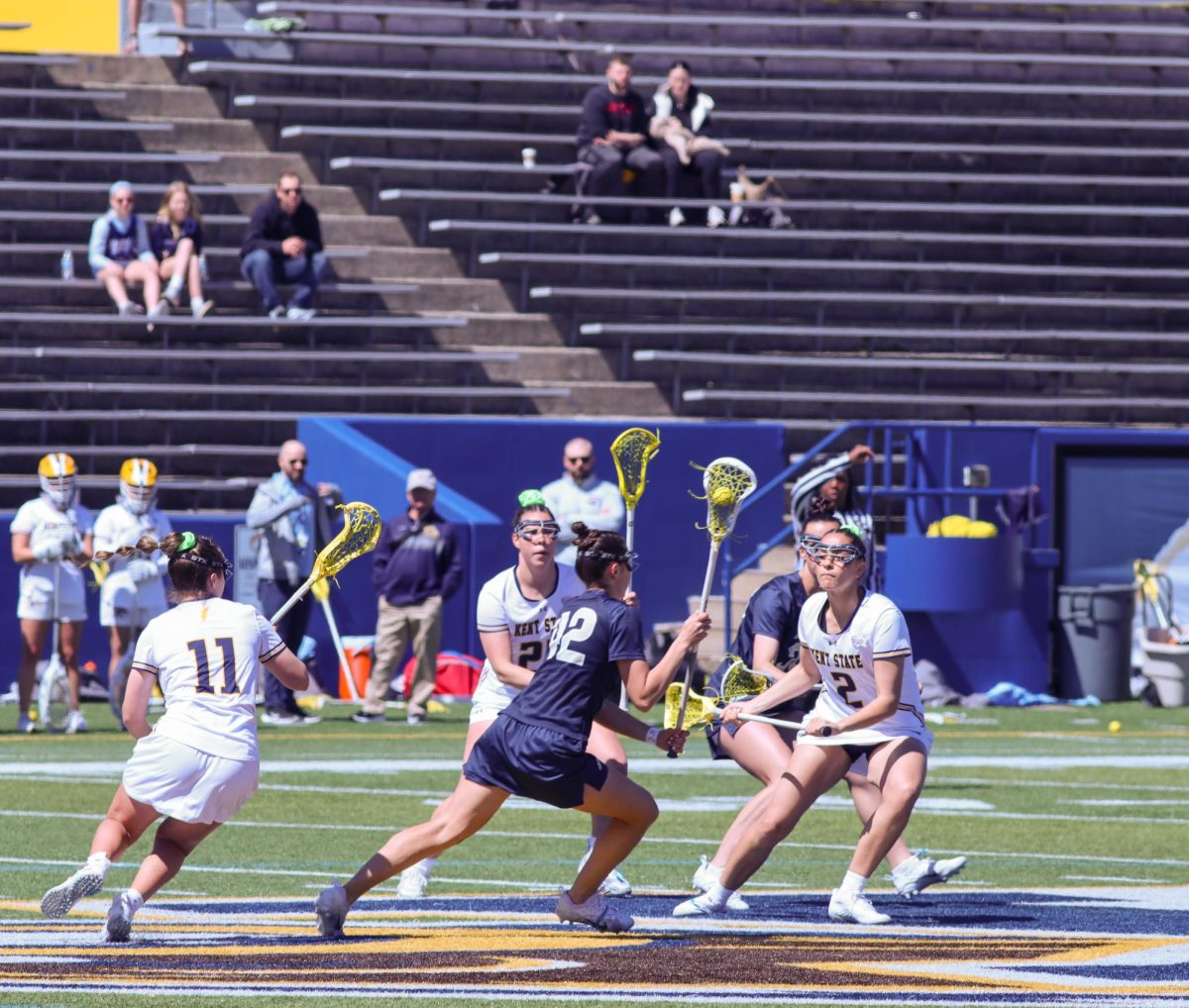 Womens+lacrosse+teams+up+against+the+Akron+during+its+game+April+7%2C+2024.