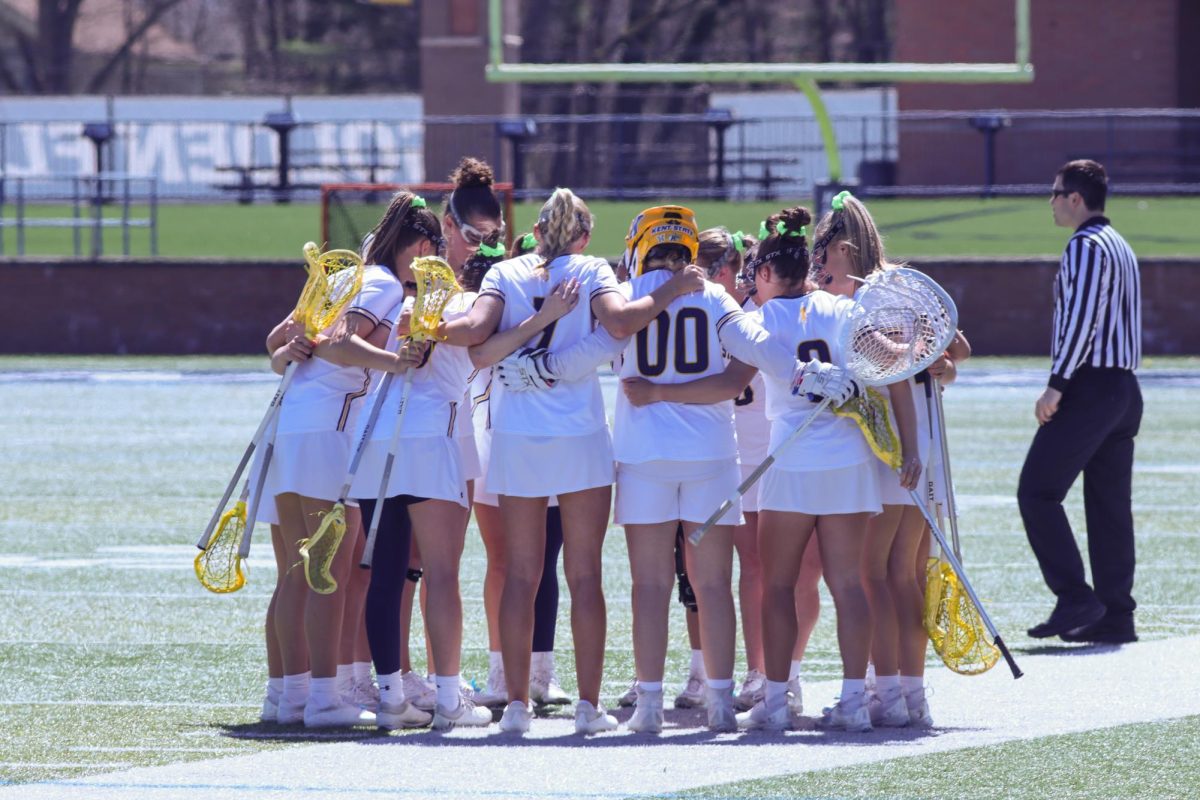Team huddle before a rivalry face-off against the University of Akron on April 7, 2024.