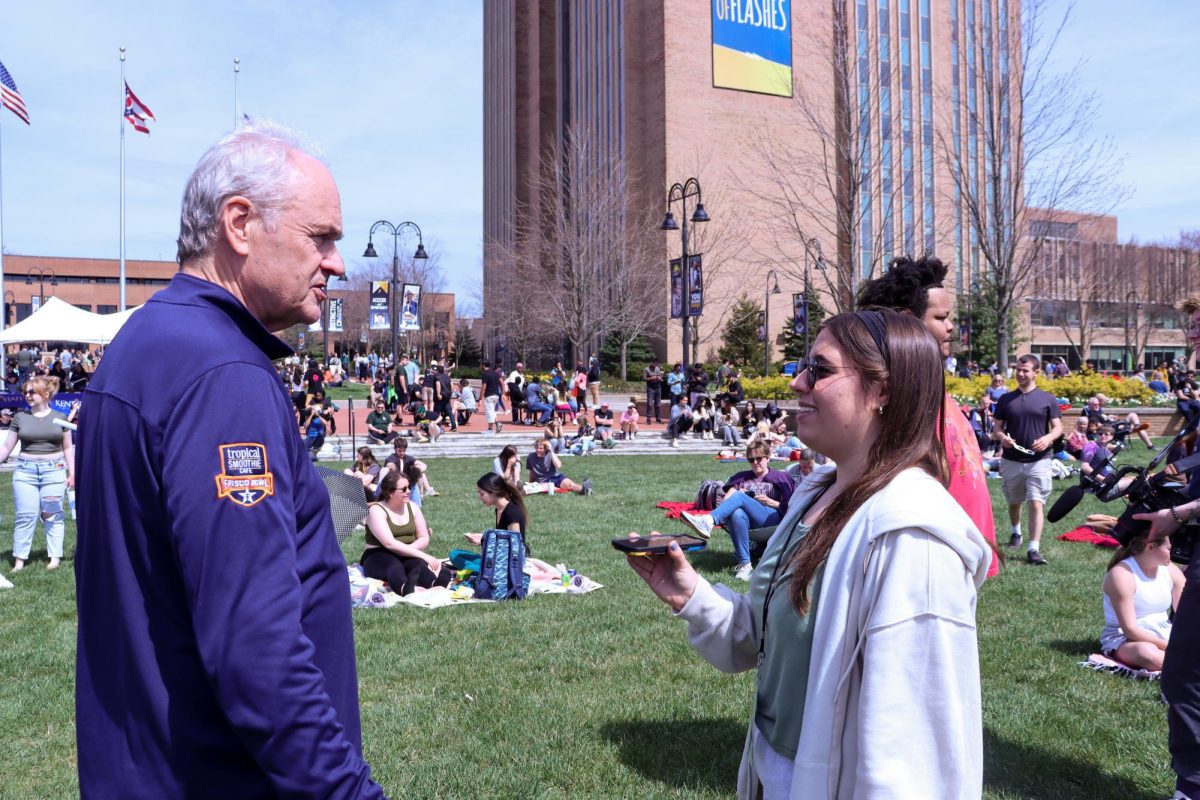 President Todd Diacon interviews with KentWired reporter Adriana Gasiewski about the solar eclipse April 8, 2024.