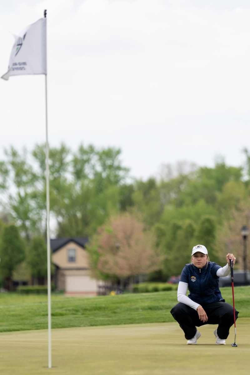 Senior Hester Sicking surveys the putting line at the fourth hole during the final round of the Mid-American Conference Championships in Grove City, OH, on April 24, 2024.
