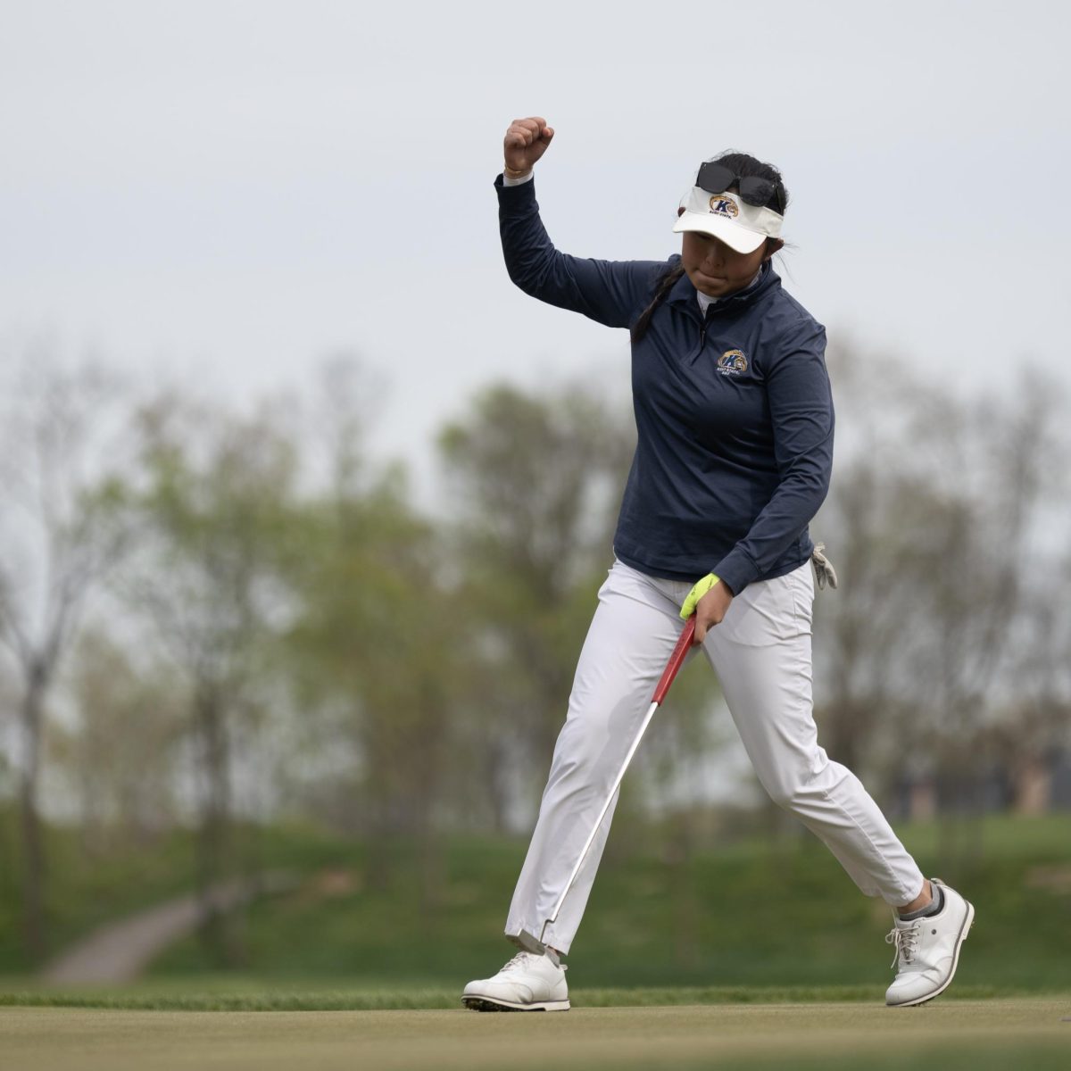 Sophomore Leon Takagi celebrates sinking the final put of the final round of the Mid-American Conference Championships in Grove City, OH, on April 24, 2024.