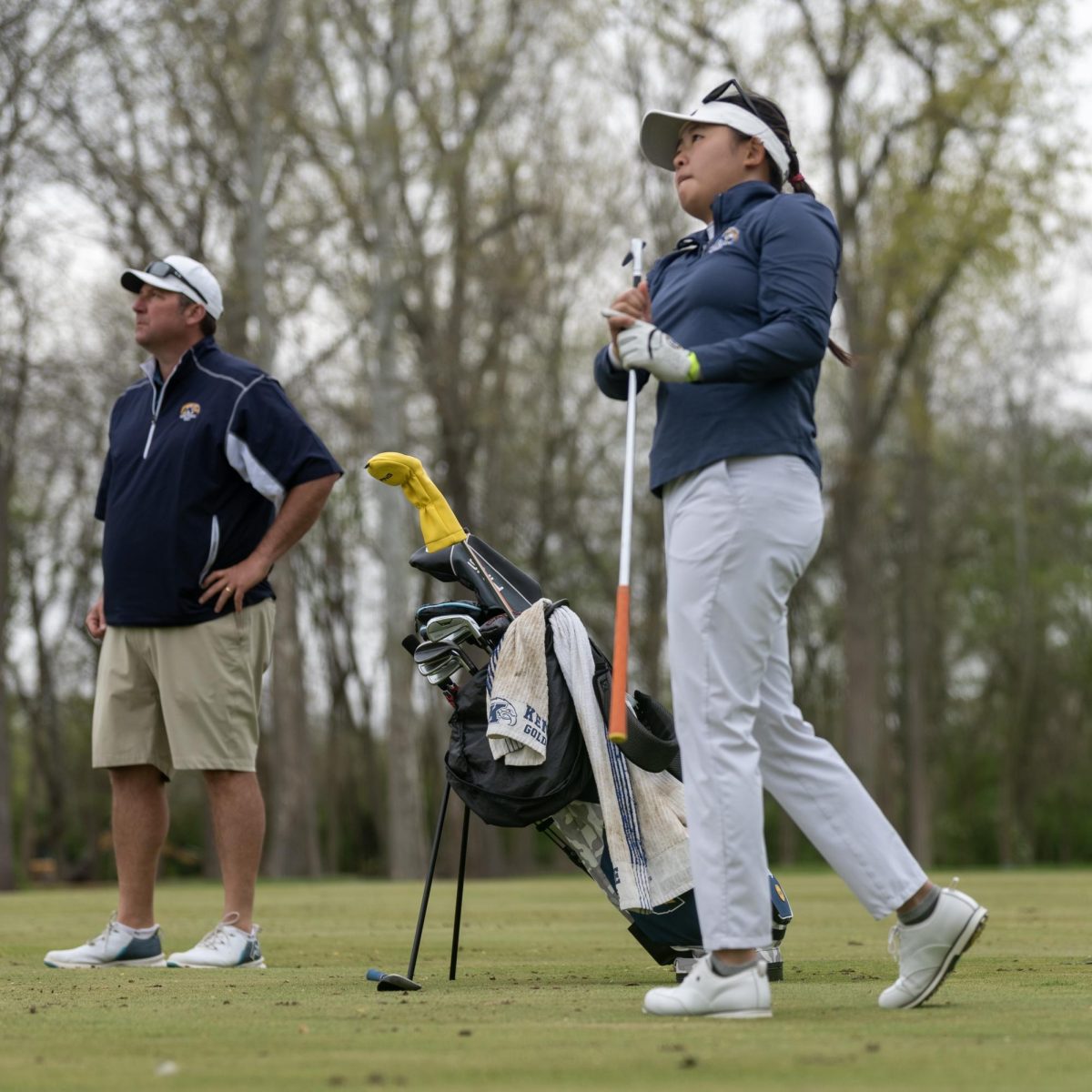 Sophomore Leon Takagi watches the approach with Head Coach Casey VanDamme on the eighth hole of the final round of the Mid-American Conference Championships in Grove City, OH on April 24, 2024.