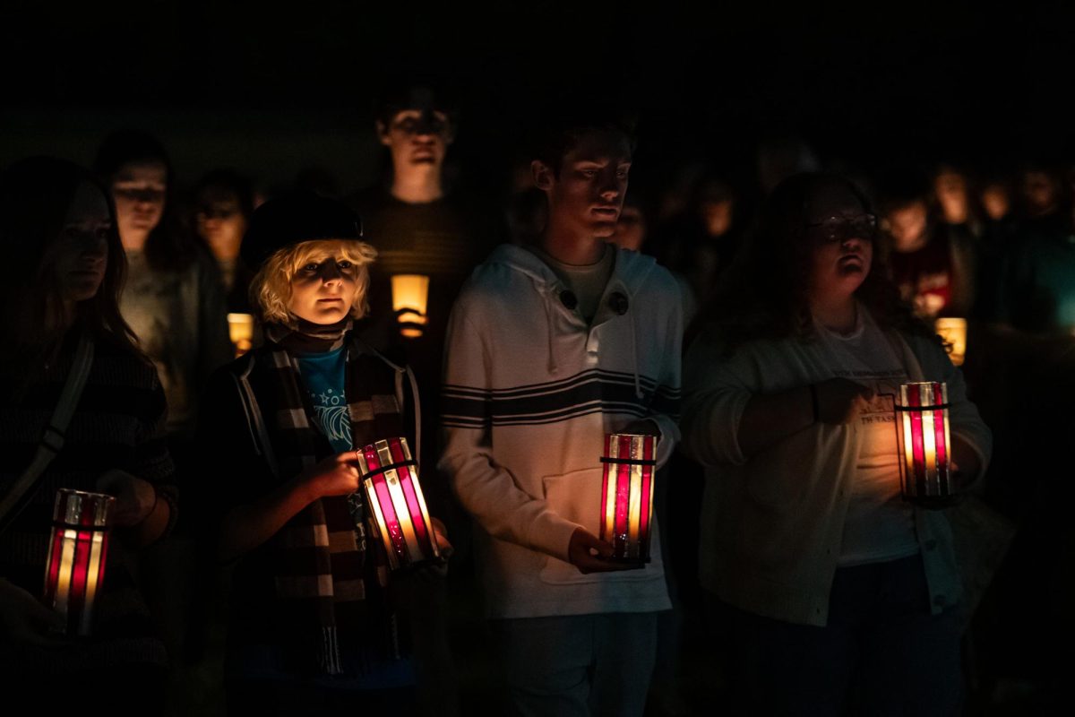 Community members gather for annual May 4 candlelight walk and vigil