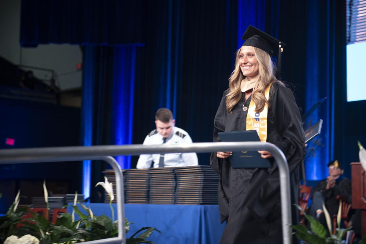 Macy Marie Dimacchia accepts her diploma on May 9, 2024, at the masters, educational specialist and doctoral commencement in the Memorial Athletic and Convocation Center.