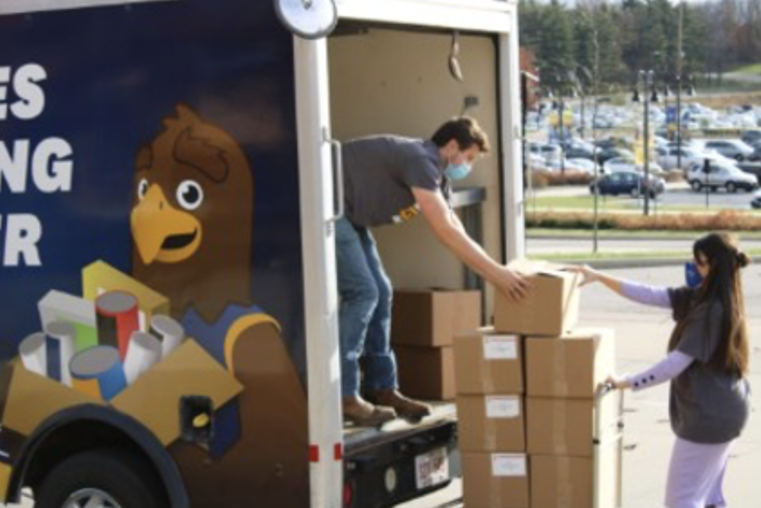 Flashes Fighting Hunger distributing food. 