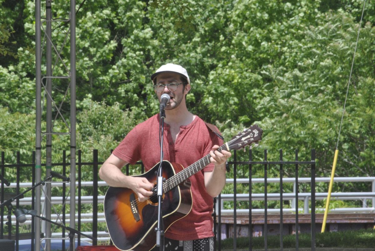 Ray Flanagan performs at the Art and Wine Festival held in downtown Kent. 