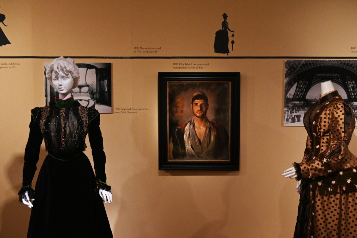 The fashline timeline exhibit showcases Kent States collection of historical fashions. 