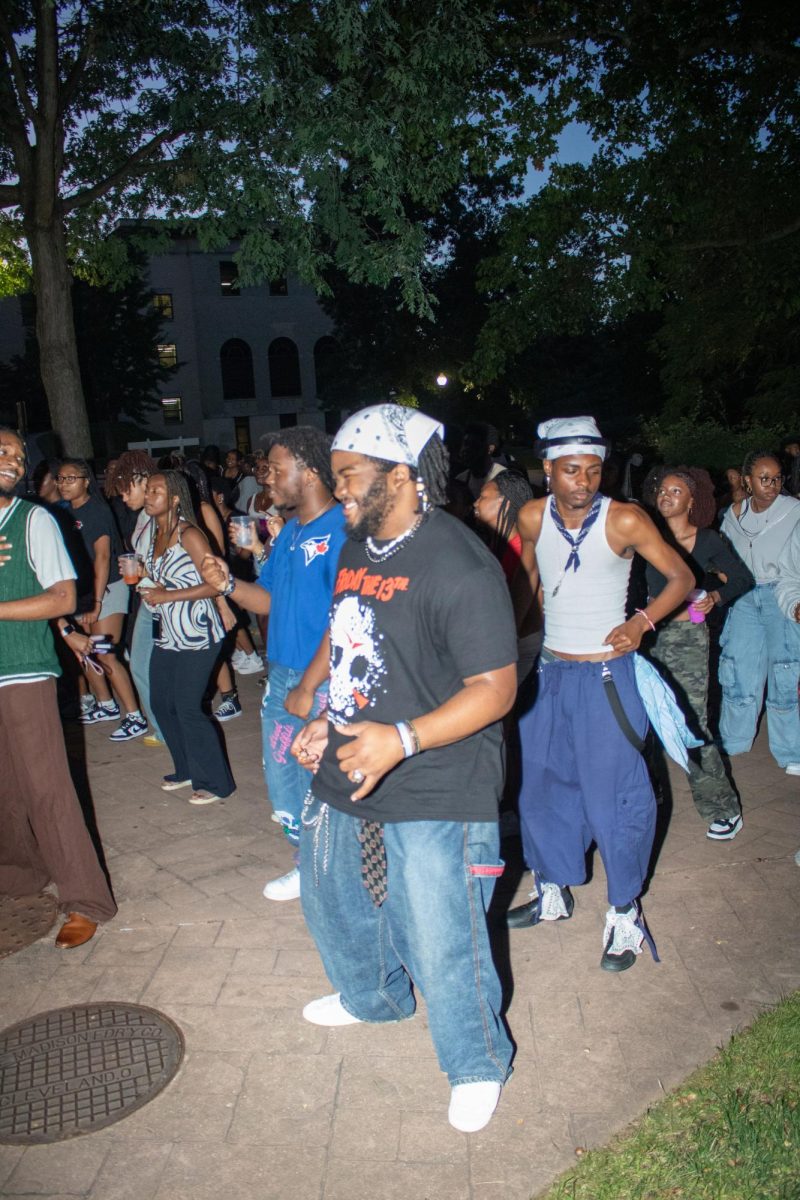 Students dance together at BUS's Block Party outside of Oscar Ritchie Hall in celebration of the new fall semester at Kent State University on August 29th, 2024. 

