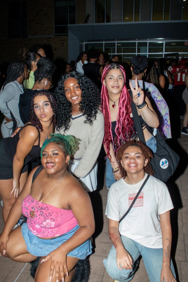 Kent State freshmen pose for a photo at BUS's Block Party outside of Oscar Ritchie Hall in celebration of the start of the new fall semester on August 29th, 2024.