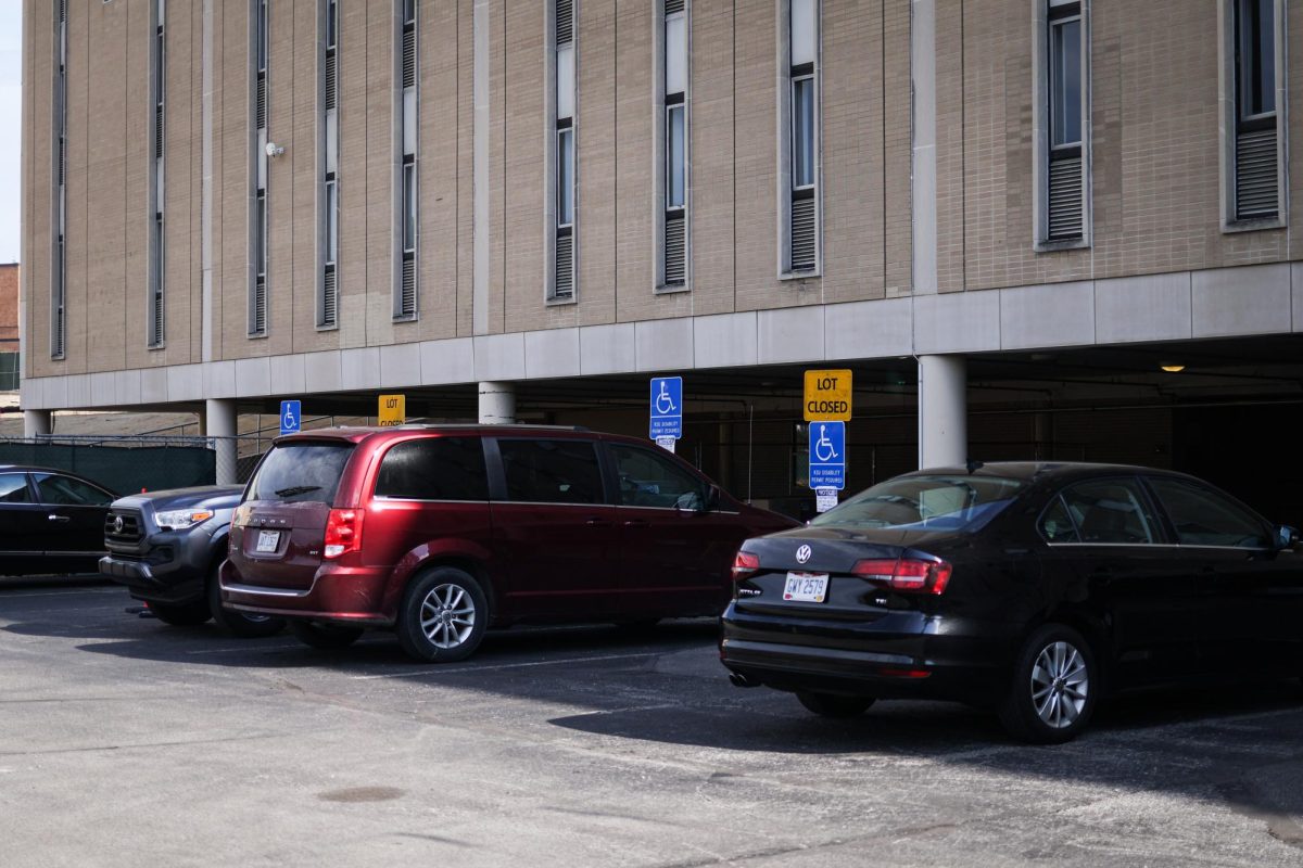 The parking lot by White Hall has Lot Closed signs on August 27, 2024.