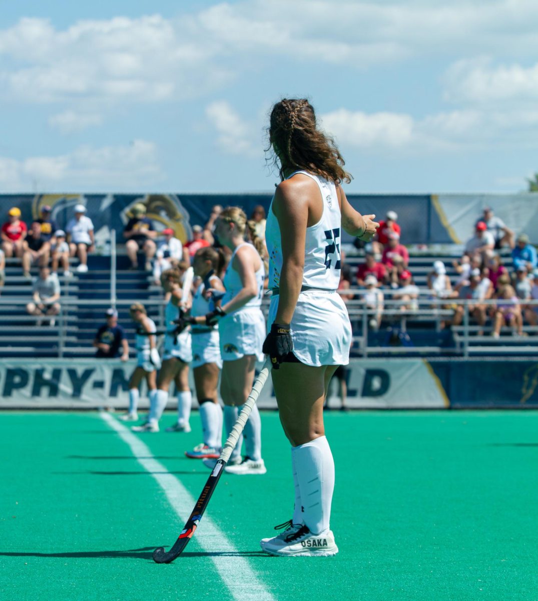 Eva Usoz, Kent State Sophomore and Field Hockey Midfielder, prepares to take a corner against their opponents, the Liberty Flames, Sept. 1, 2024.