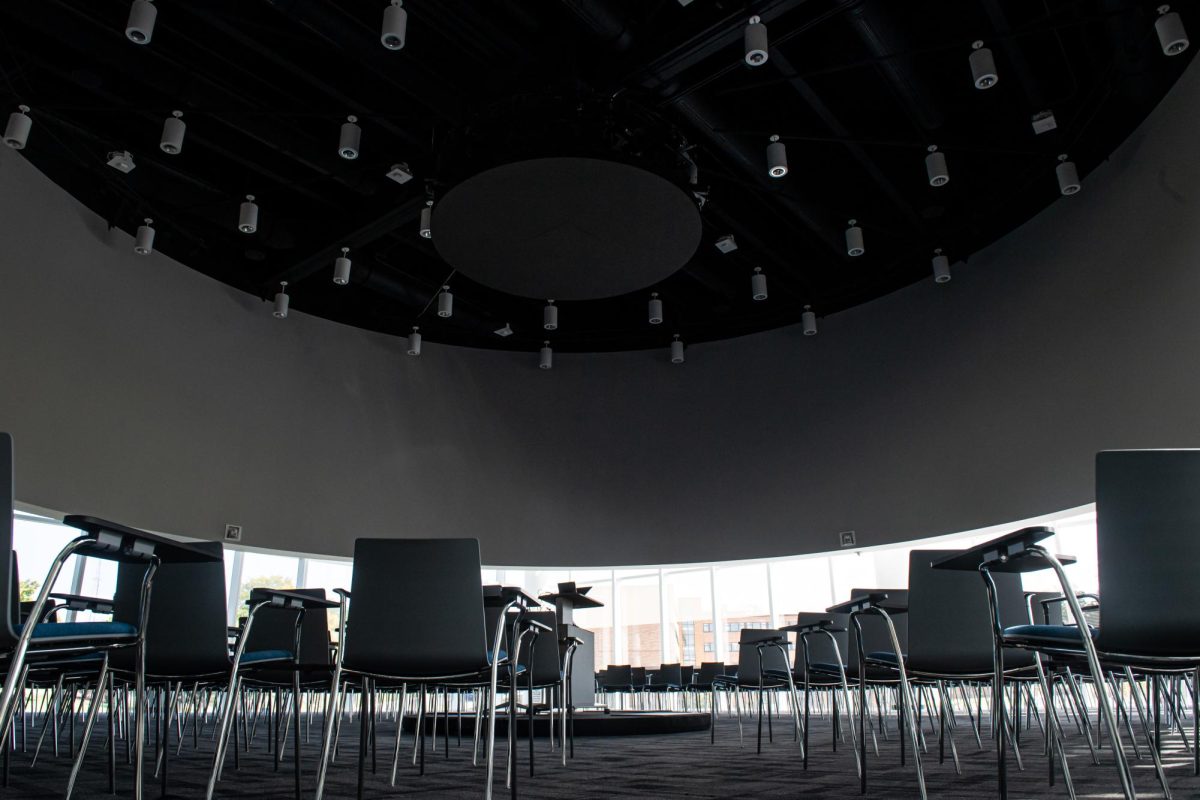 Equiped with multiple projectors along a concave segment of the ceiling, the James R. Unger Global Forum offers a 360 degree projection designed to facilitate a lecture hall with the professor at the center of the room.