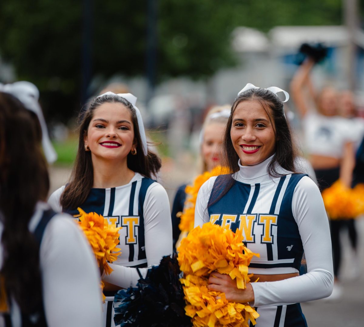 Kent State cheerleaders walks in the Homecoming parade, Sept. 28, 2024.