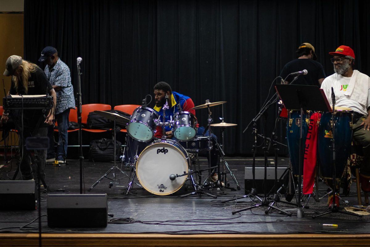 Vince Robinson and the Jazz Poets warm up before a performance at the Black Alumni Chapter Homecoming Marketplace and Dance on Sept. 27, 2024.