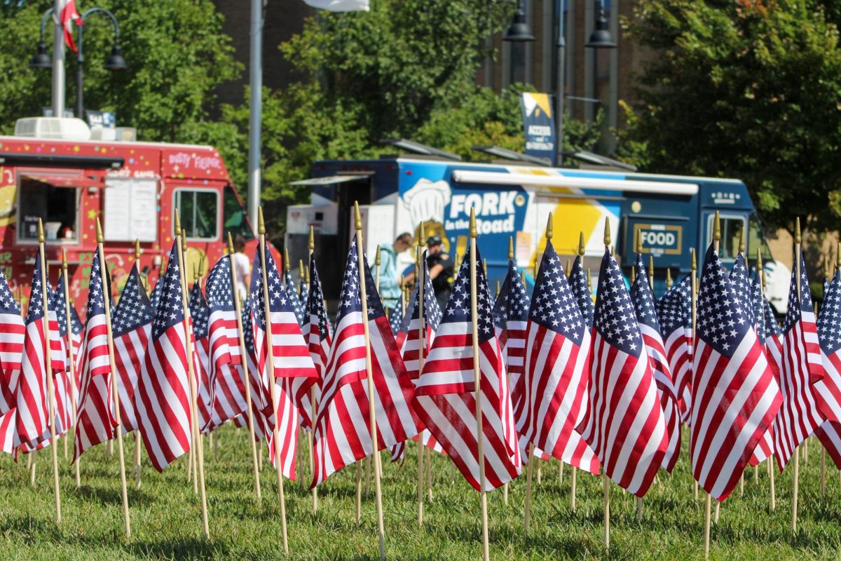 Students from Young America's Foundation remember the Sept. 11 attacks Wednesday with a flag covered student green. The date marked 23 years since the terrorist attacks.