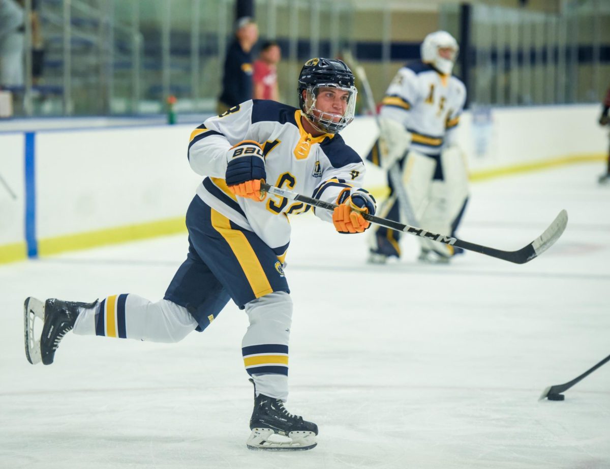 Cole Bianchin, Kent State freshman and forward, takes a shot on goal during warm ups before the game against Northern Illinois. Sept. 14th, 2024